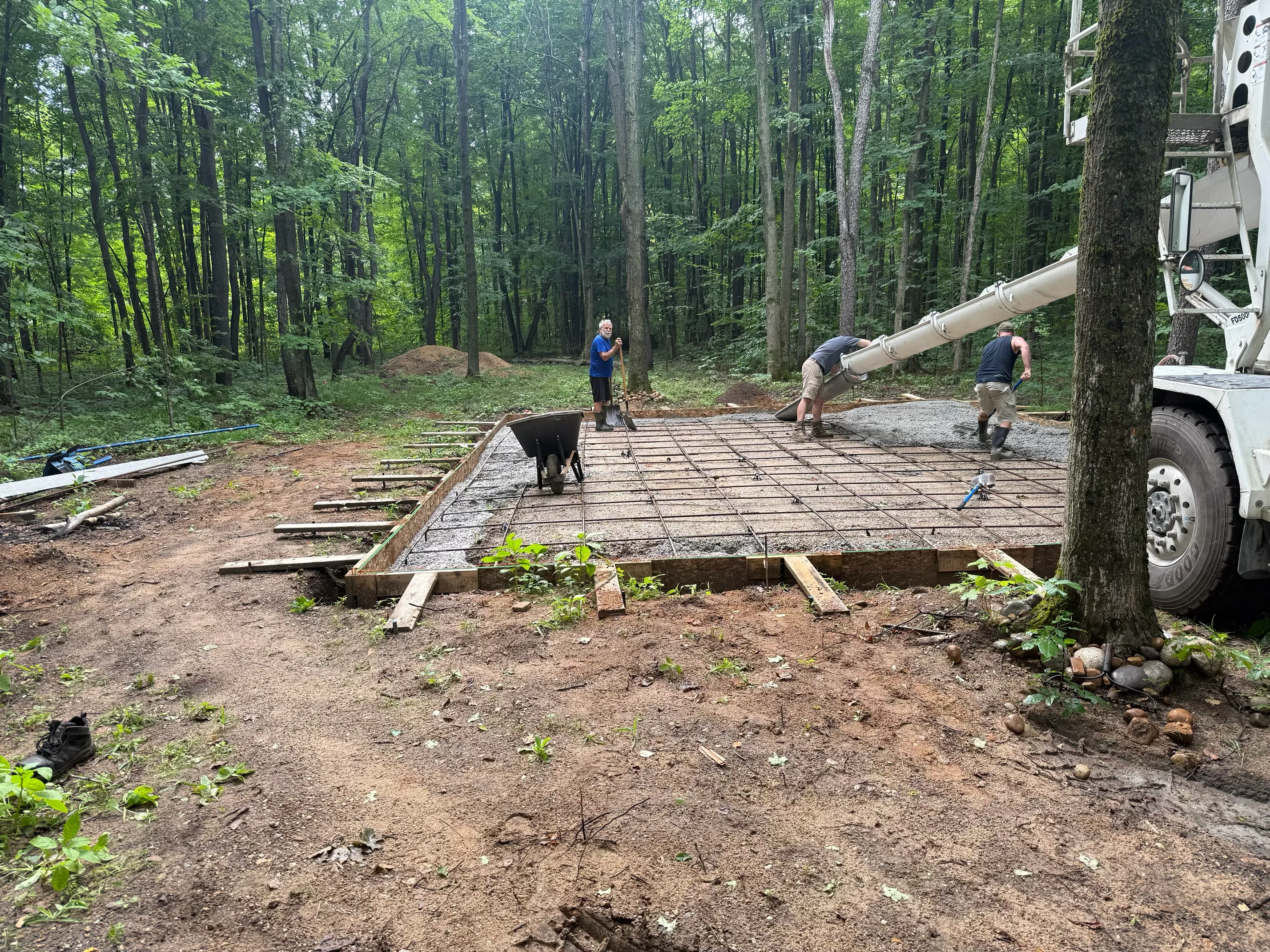 Gerhard and Sons crew pouring a concrete slab foundation in Northwest Michigan